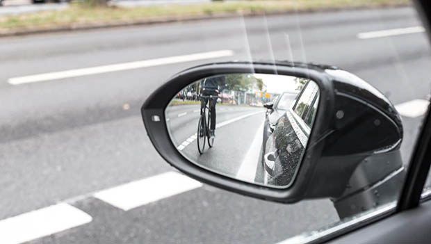 cyclist in rearview mirror